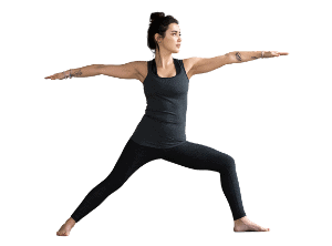 Woman in Warrior II yoga pose asana